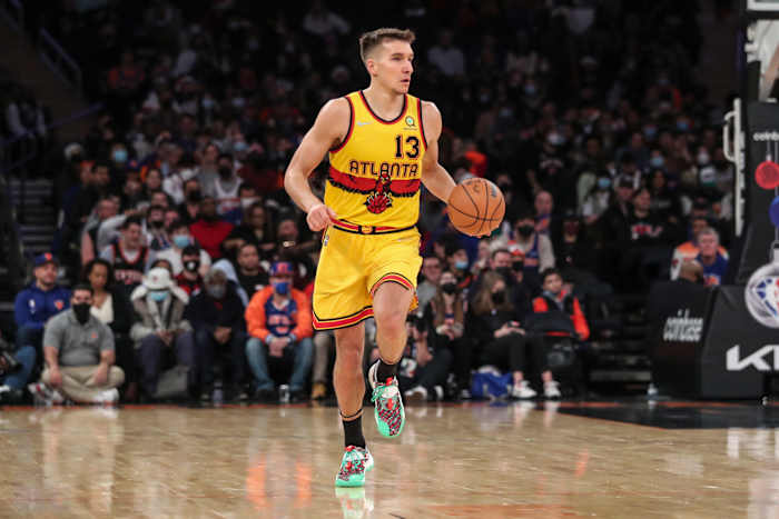 Bogdan Bogdanovic dribbles the ball.